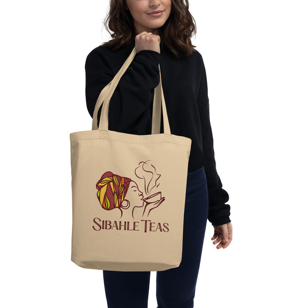woman carrying Sibahle tote with logo
